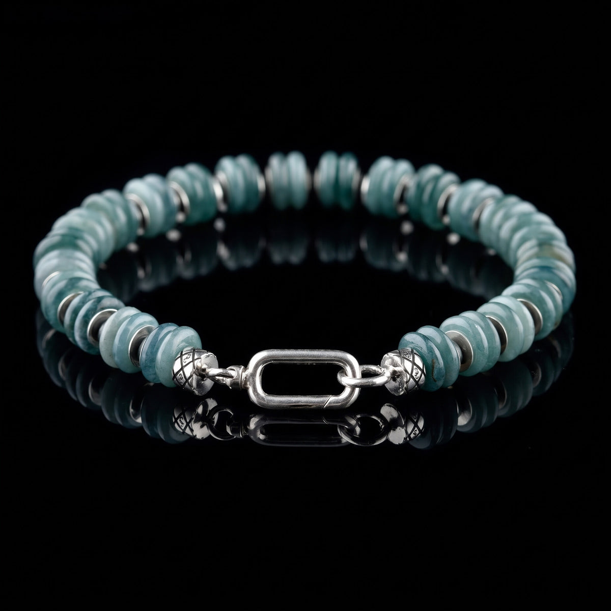Guatemalan Jade Bracelet I with blue-green jade beads, hematite spacers and a sterling silver clasp