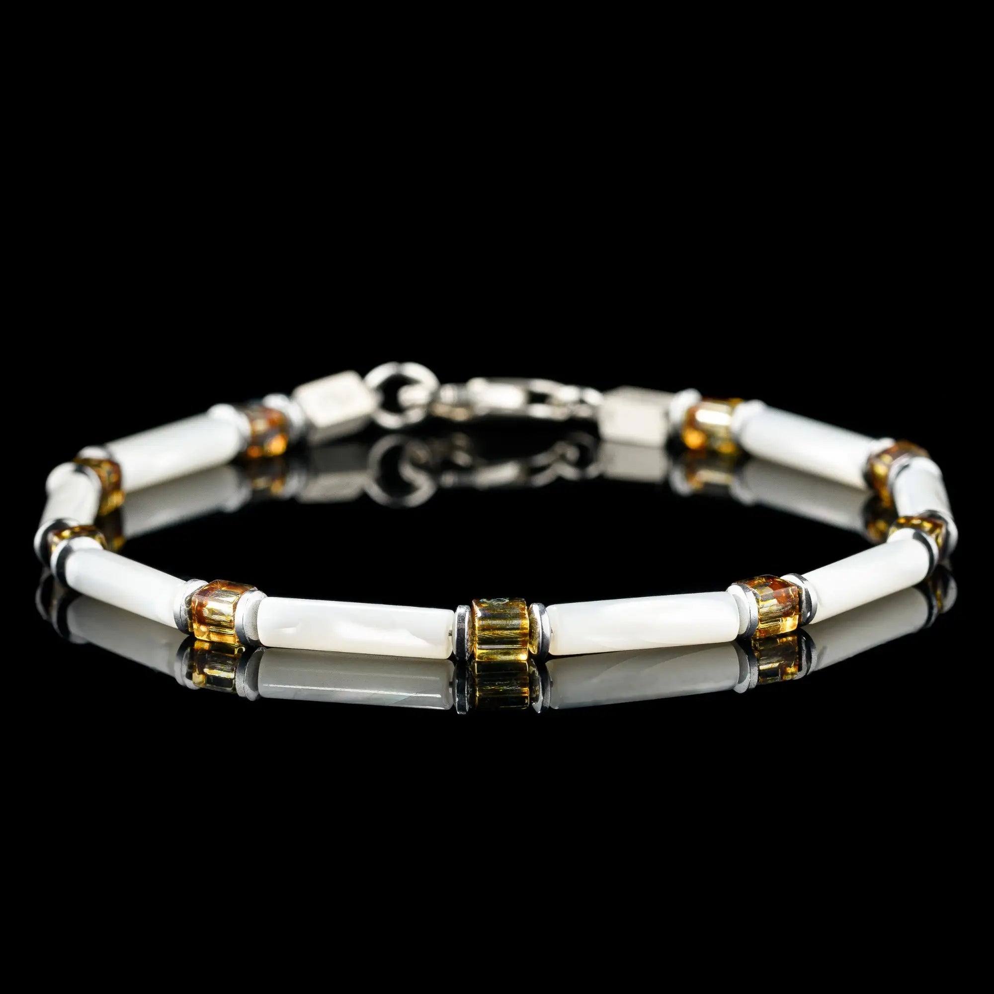 Mother of pearl bracelet for men. 4mm iridescent nacre beads. Aurum Brothers.