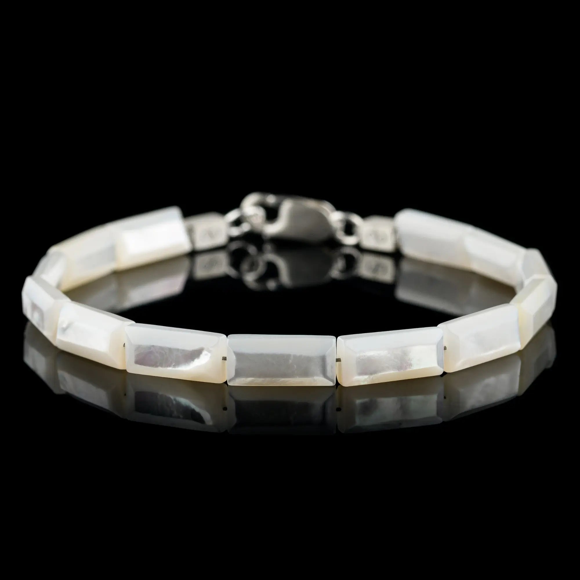Silver lip oyster bracelet for men. 13x6mm shell tiles. Aurum Brothers.