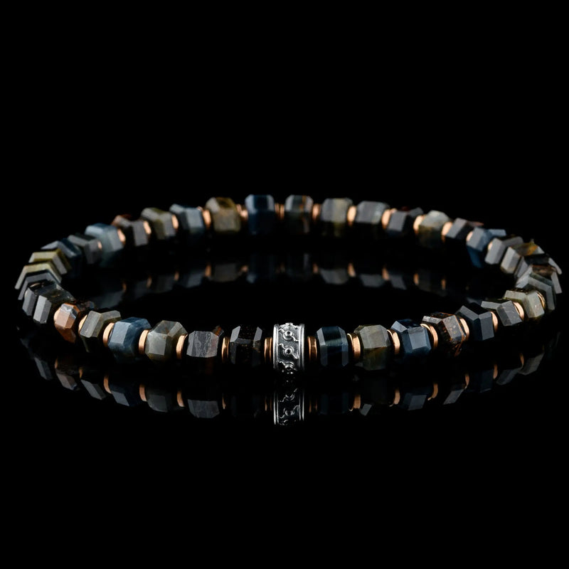 Blue tiger eye bracelet for men. 6mm Hawk's Eye hexagon-cut beads with copper accents. Aurum Brothers.