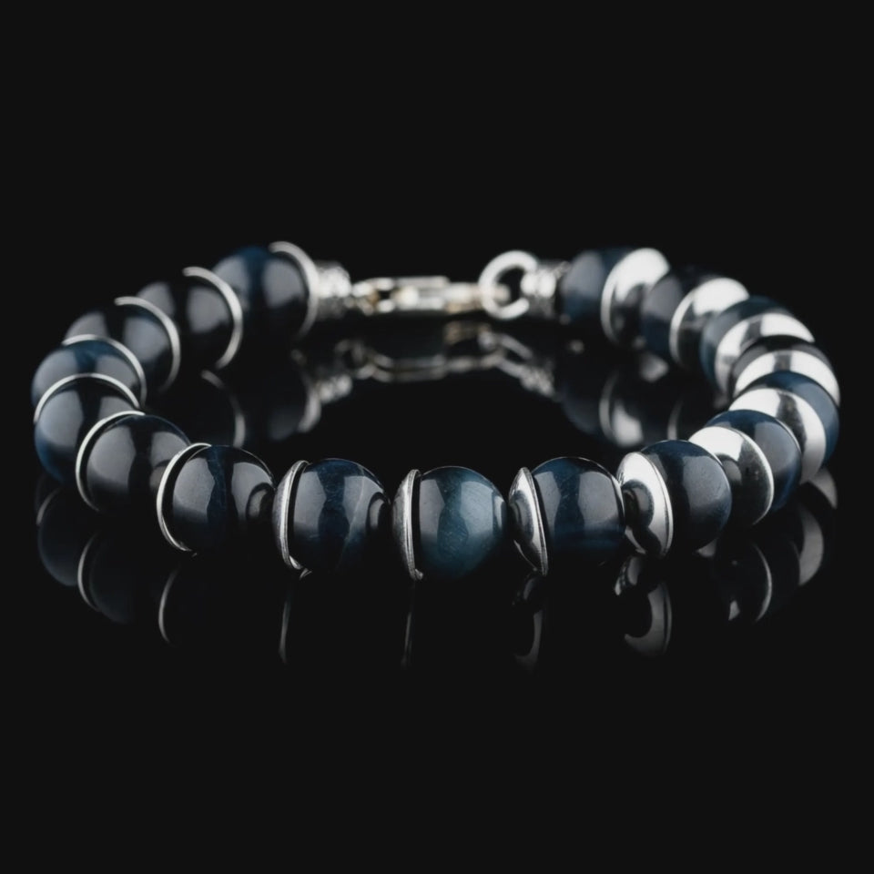 Product video of Blue Tiger Eye Bracelet V (10mm), showing the blue beads, silver spacers and clasp.